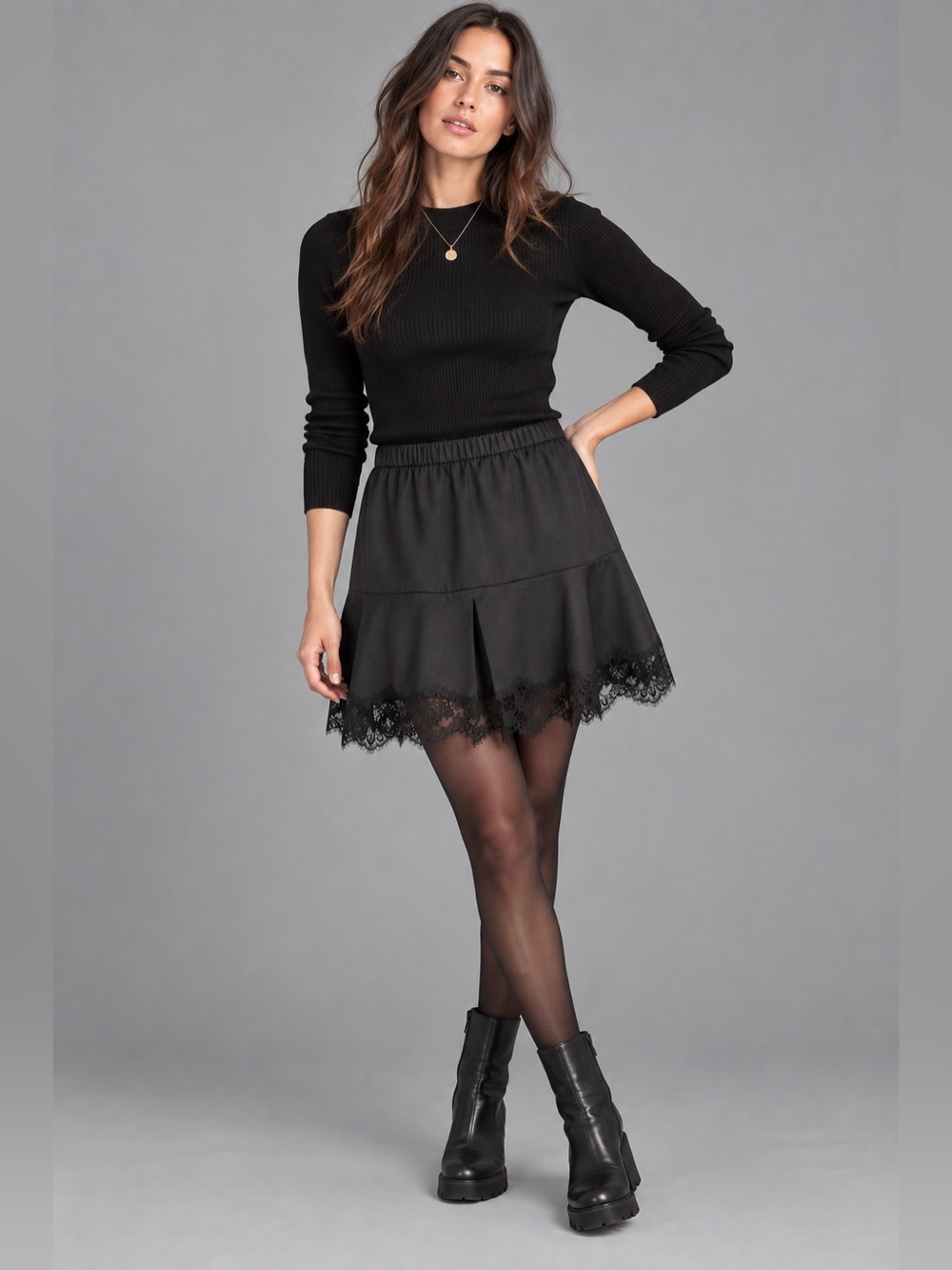 New with tags Falcon & Bloom black lace-trim mini skirt in women’s size Large